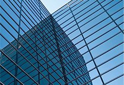 Security film applied to a glazed panel